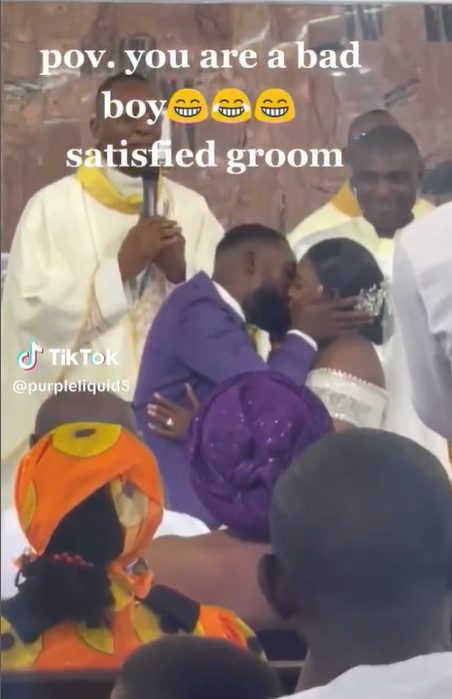Priest hilariously intervenes as groom takes so much time in kiss!ng wife at wedding ceremony